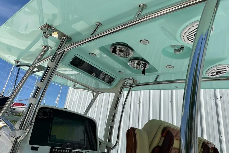 Slide: The Image of 2020 Mag Bay 33 CC boat interior with sleek design and advanced controls. - 17