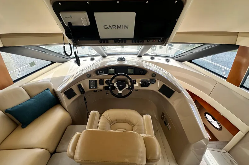 Slide: The Image of Luxurious helm of 2006 Carver 56 Voyager yacht with Garmin navigation system. - 14