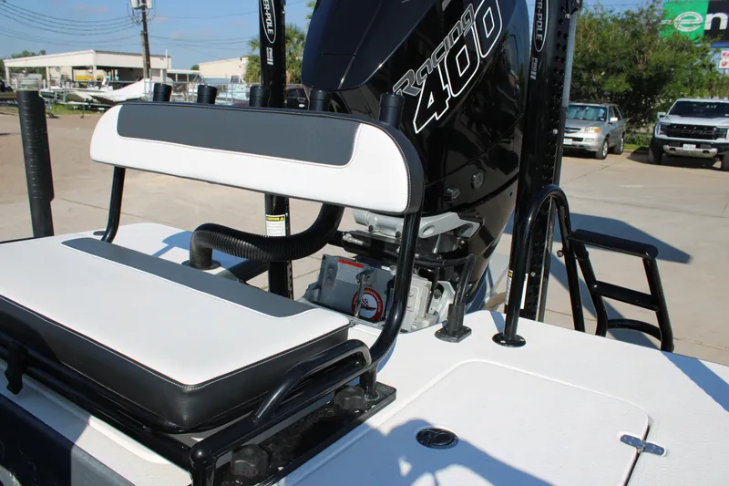 Slide: The Image of 2023 Mamba 24VX boat with Racing 400 engine, featuring a sleek white and black seat design. - 6