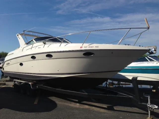 The Image of 1995 Regal Commodore 322 boat on trailer, side view. - 0