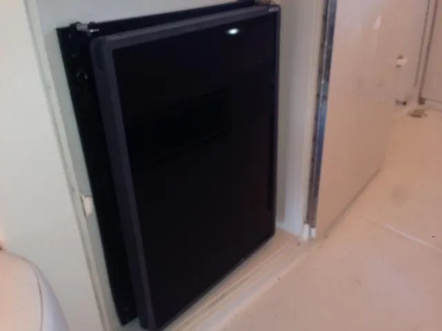 Slide: The Image of Regal Commodore 322 refrigerator, 1995 model, interior view. - 11