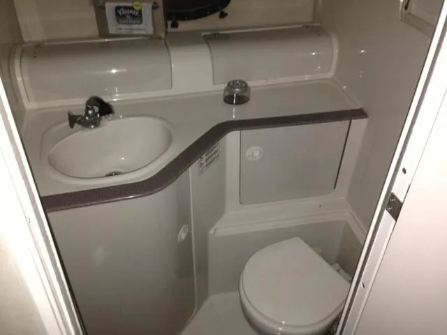 Slide: The Image of Bathroom in Regal Commodore 322 boat, year 1995. - 13
