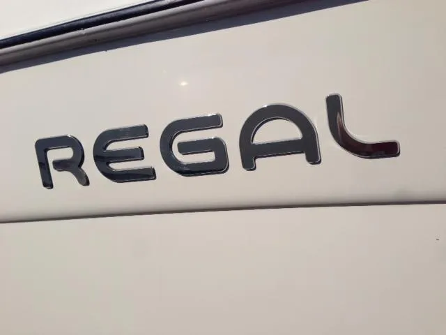 Slide: The Image of Regal Commodore 322 boat logo, year 1995. - 5
