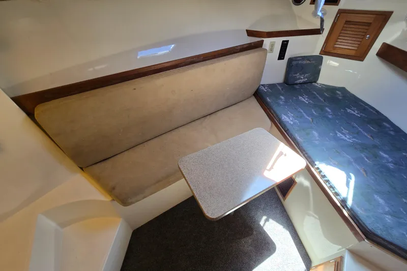 Slide: The Image of Interior of 2003 Albemarle 305 Express Fisherman with seating and table. - 21
