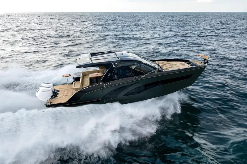The Image of 2027 Hanover 387 boat cruising swiftly on open water, showcasing sleek design and powerful performance. - 0