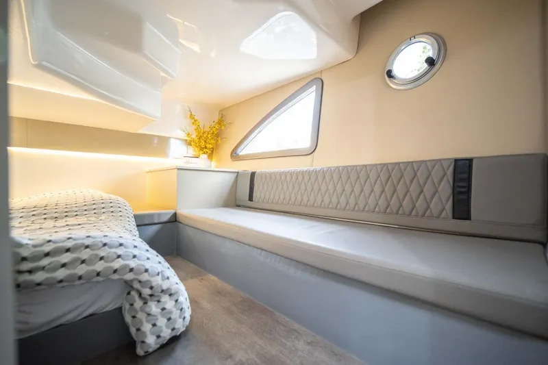 Slide: The Image of Luxurious interior of 2027 Hanover 387 yacht with modern seating and elegant decor. - 3