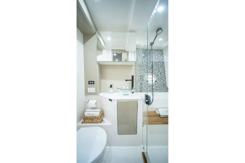Slide: The Image of Modern bathroom in Hanover 387 yacht, featuring glass shower and sleek fixtures, 2027 model. - 9
