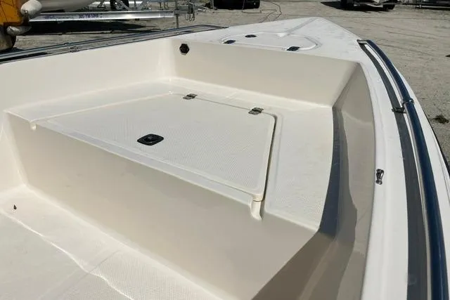 Slide: The Image of 2006 Key West 1720 Center Console boat deck with storage compartment. - 3