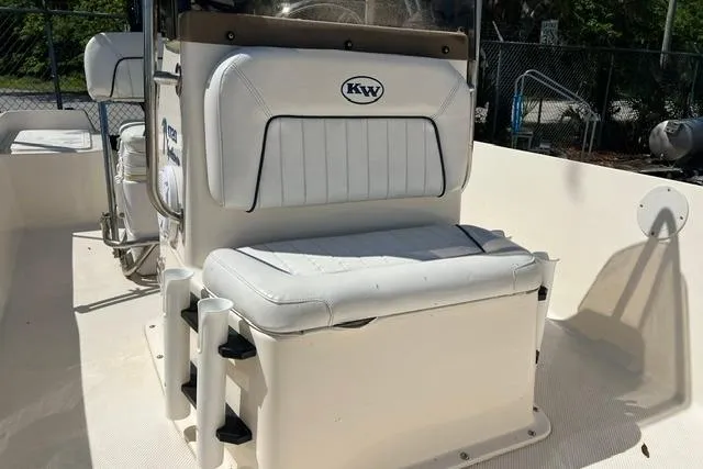 Slide: The Image of 2006 Key West 1720 Center Console boat interior with white seating and console. - 4