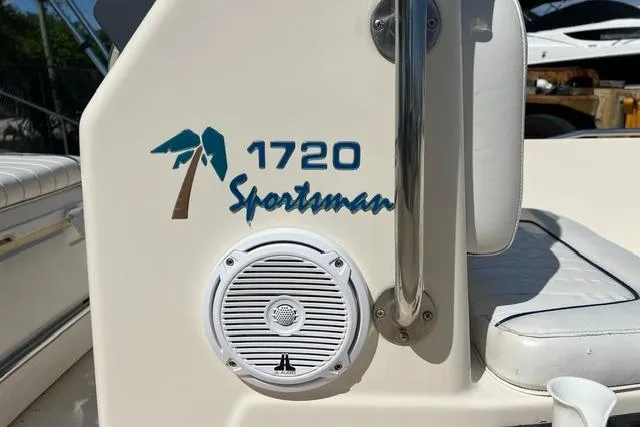 Slide: The Image of 2006 Key West 1720 Center Console boat with speaker and palm tree logo. - 5