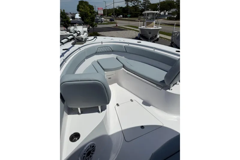 Slide: The Image of 2026 Sportsman Open 262 Center Console boat with spacious seating area. - 5