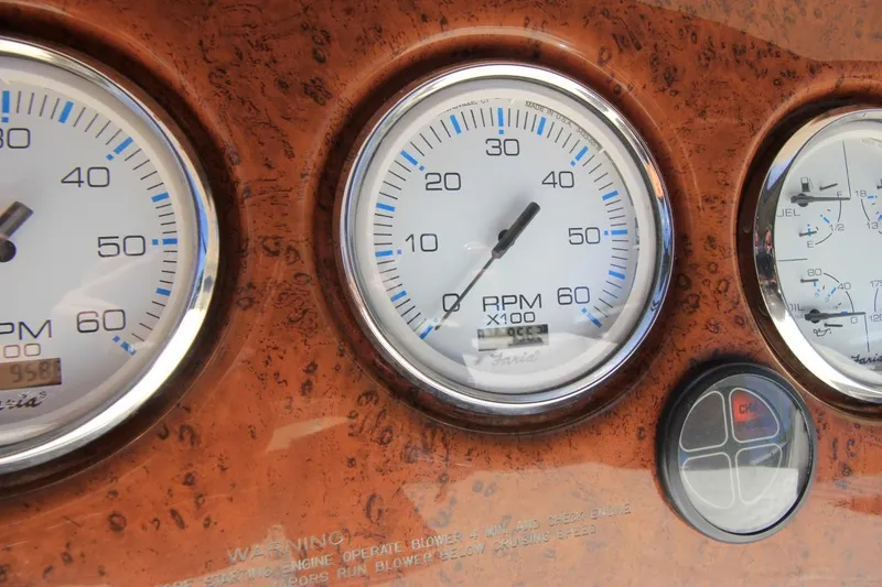 Slide: The Image of Close-up of 2006 Silverton 38 Sport Bridge dashboard gauges and controls. - 28