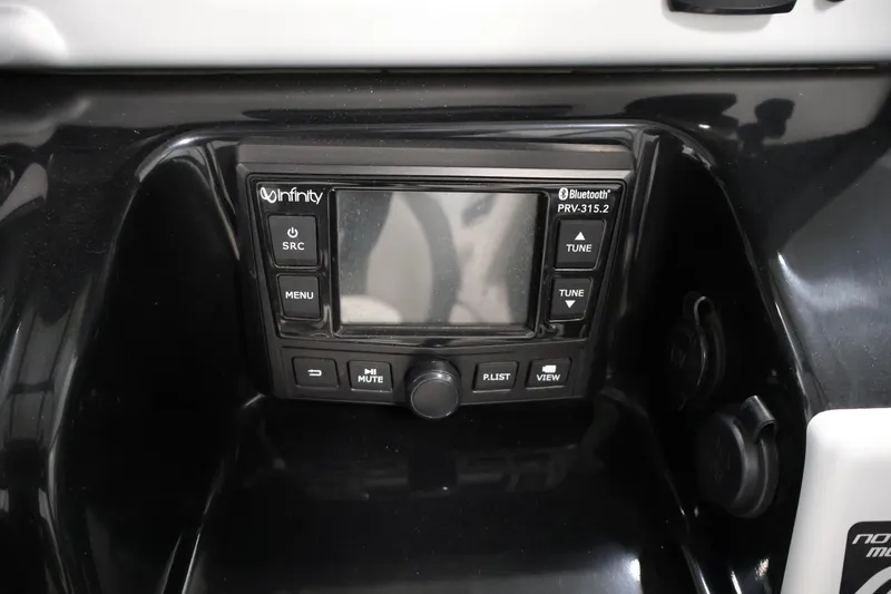 Slide: The Image of 2021 Yamaha AR210 boat stereo system with Bluetooth connectivity and control panel. - 26