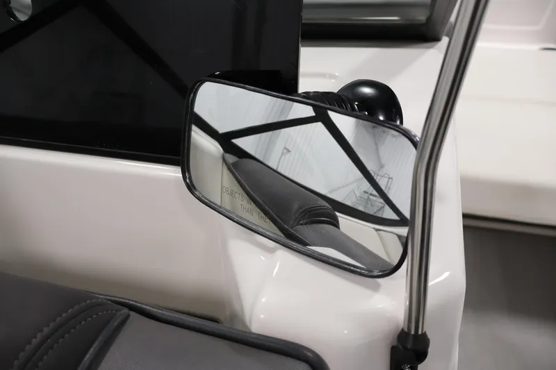 Slide: The Image of 2021 Yamaha Boats AR210 side mirror and interior detail. - 35