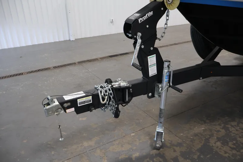 Slide: The Image of Trailer hitch of a 2021 Yamaha Boats AR210 in a garage setting. - 45