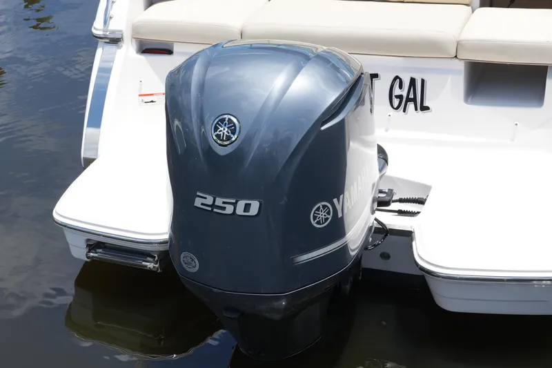 Slide: The Image of 2019 Regal 23 OBX boat with Yamaha 250 outboard motor on water. - 15