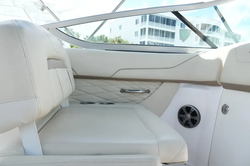 Slide: The Image of Interior of 2019 Regal 23 OBX boat with beige seating and modern design elements. - 31