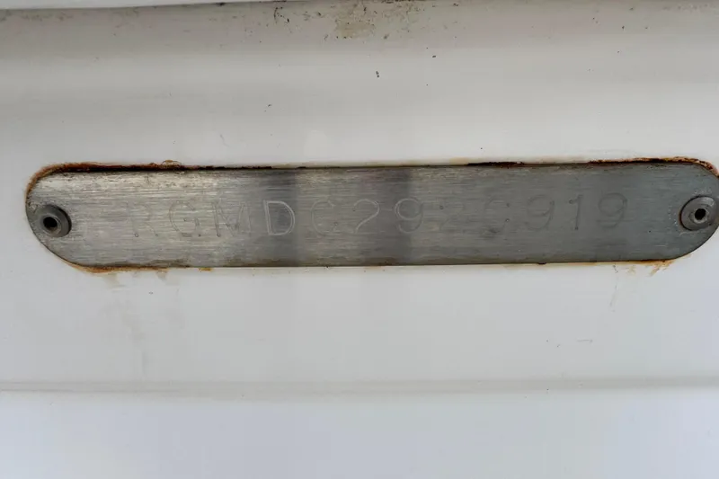 Slide: The Image of Metallic identification plate on a 2019 Regal 23 OBX boat hull. - 34