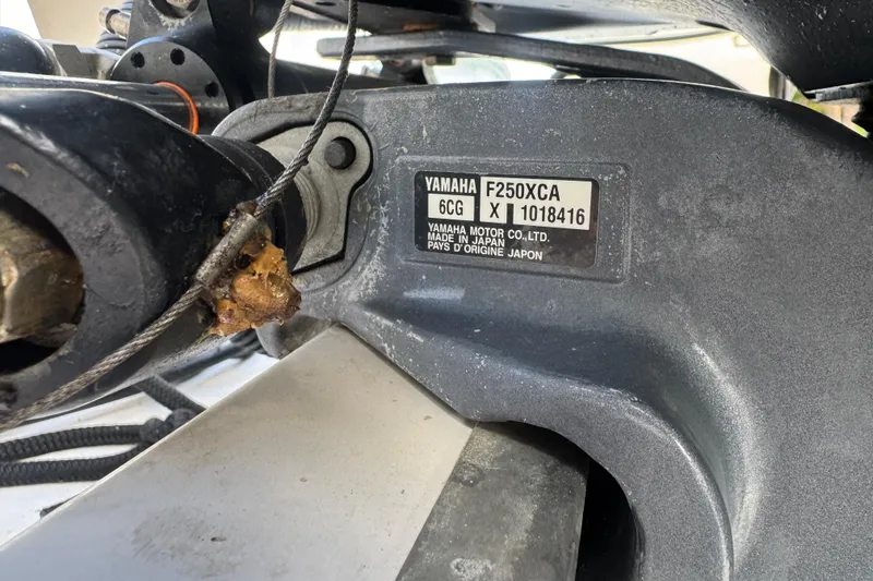 Slide: The Image of Close-up of Yamaha F250XCA engine label on 2019 Regal 23 OBX boat. - 35