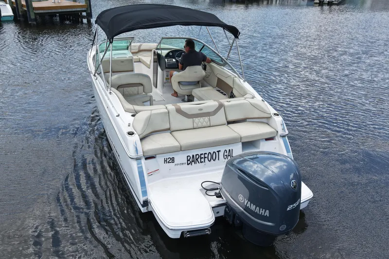 Slide: The Image of 2019 Regal 23 OBX boat with Yamaha engine on calm water. - 9