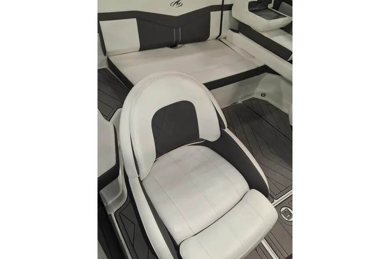 Slide: The Image of 2022 Monterey 218SS Super Sport boat interior with sleek white and black seating. - 10