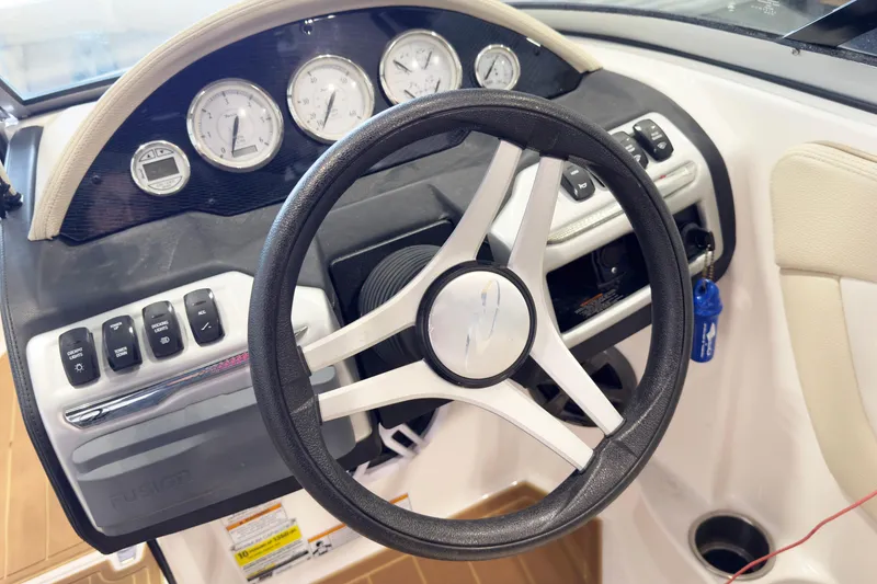 Slide: The Image of Steering wheel and dashboard of 2018 Regal 2000 ES Bowrider boat. - 7