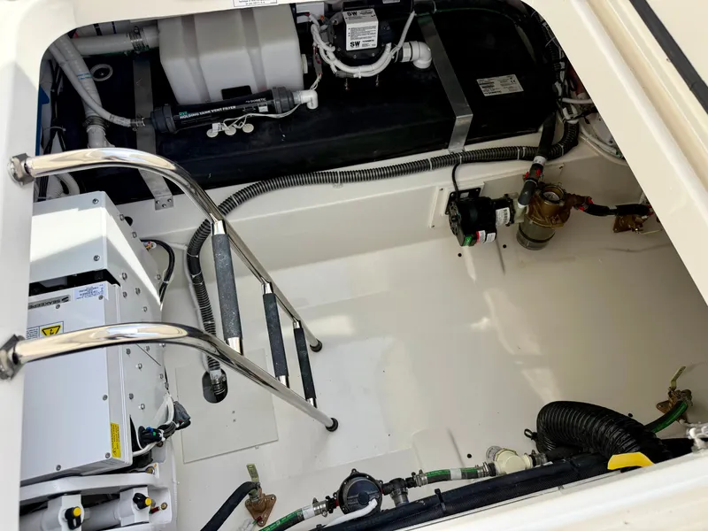 Slide: The Image of Engine compartment of the Tiara Yachts 43LS with modern equipment and tidy wiring. - 38