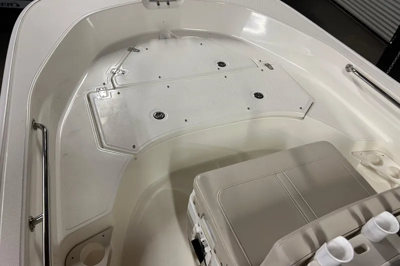 Slide: The Image of 2019 Boston Whaler 170 Montauk boat interior with seating and storage compartments. - 11