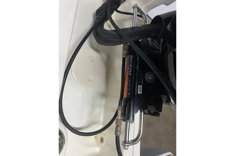 Slide: The Image of BayStar hydraulic steering system on a 2019 Boston Whaler 170 Montauk boat. - 14