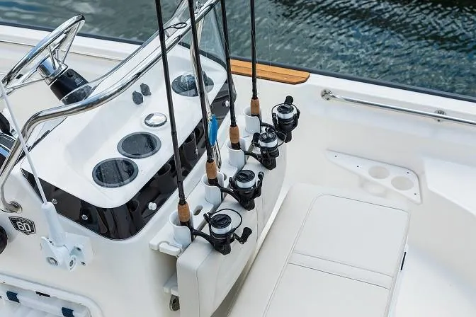 Slide: The Image of Manufacturer Provided Image: 2019 Boston Whaler 170 Montauk fishing boat console with rod holders and seating. - 31