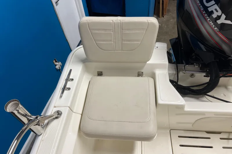 Slide: The Image of 2019 Boston Whaler 170 Montauk boat seat and Mercury engine detail. - 9