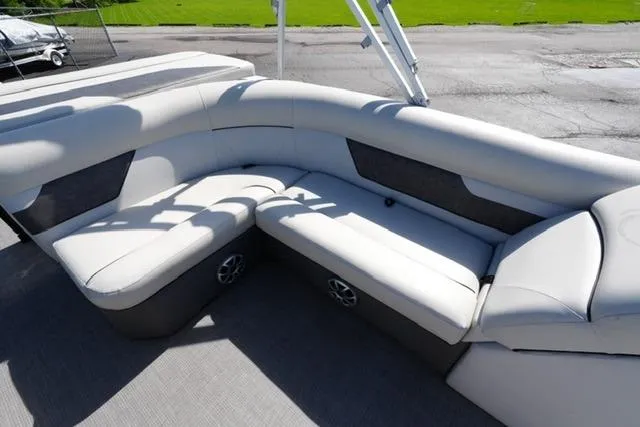 Slide: The Image of 2021 Crest Classic DLX 200 L pontoon boat with luxurious seating and modern design. - 14