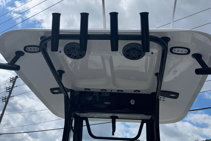 Slide: The Image of 2026 Sea Hunt Ultra 235 SE boat top view with rod holders and speakers. - 8