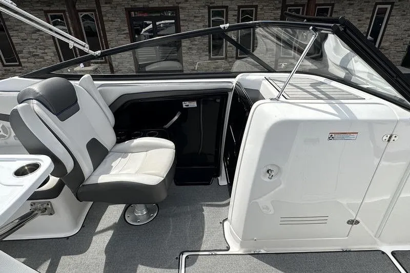 Slide: The Image of 2020 Yamaha Boats SX240 interior with seating and console, showcasing modern design and comfort. - 23