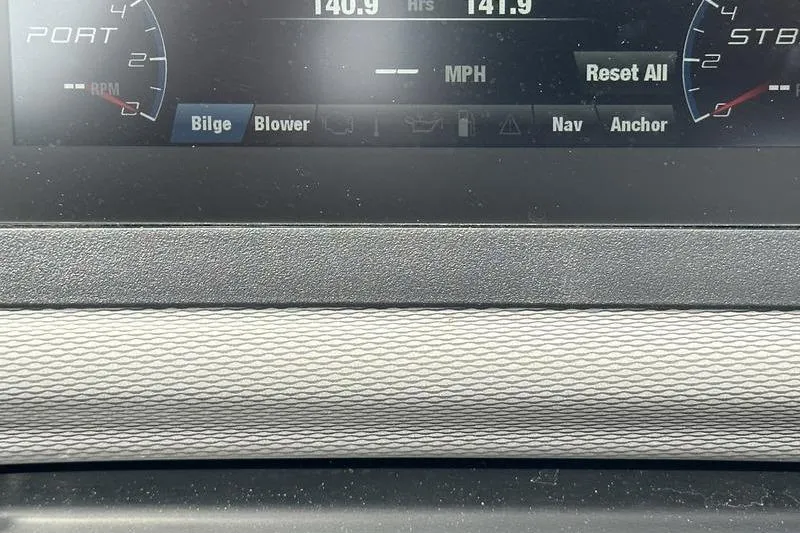 Slide: The Image of Dashboard of a 2020 Yamaha Boats SX240, displaying bilge and blower controls. - 31