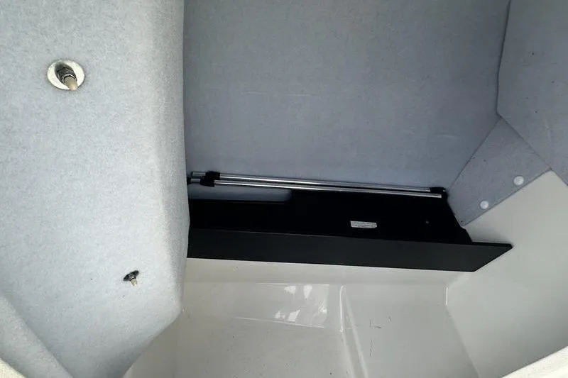 Slide: The Image of Interior storage compartment of a 2020 Yamaha Boats SX240. - 35