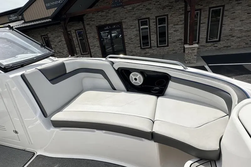 Slide: The Image of 2020 Yamaha Boats SX240 interior seating with speaker, showcasing modern design and comfort. - 39