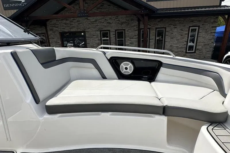 Slide: The Image of 2020 Yamaha Boats SX240 interior seating with speaker, showcasing modern design and comfort. - 45