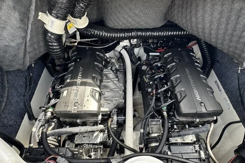 Slide: The Image of 2020 Yamaha Boats SX240 engine compartment with dual high-output engines. - 47