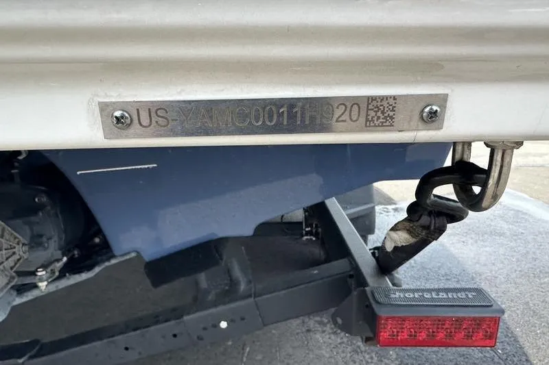 Slide: The Image of 2020 Yamaha Boats SX240 hull identification number plate on a trailer. - 48