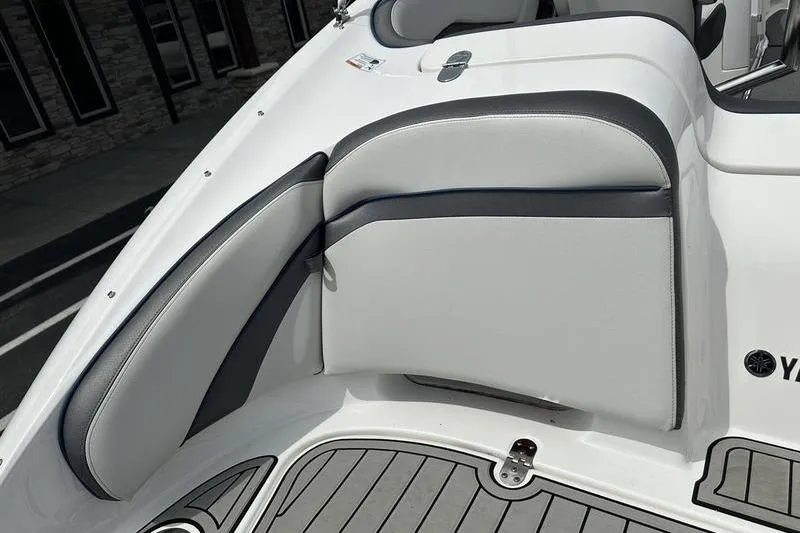 Slide: The Image of 2020 Yamaha Boats SX240 interior seating with sleek, modern design and comfortable upholstery. - 9
