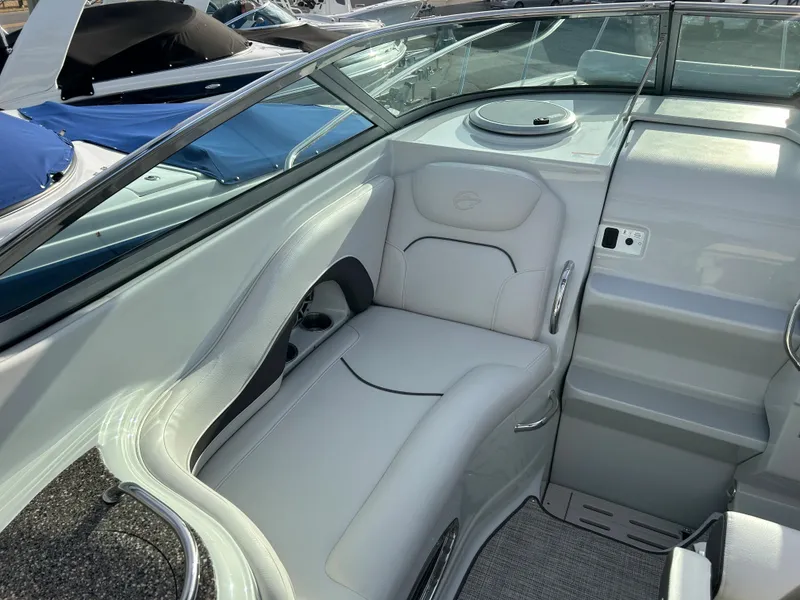Slide: The Image of Interior of 2023 Crownline 270 CR with luxurious seating. - 8