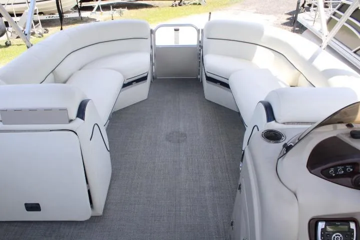 Slide: The Image of 2015 South Bay 524E pontoon boat interior with spacious seating and modern design. - 10