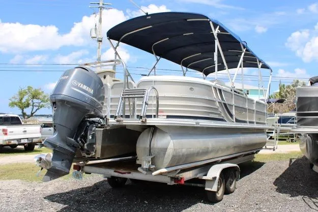 Slide: The Image of 2015 South Bay 524E pontoon boat with Yamaha outboard motor on trailer. - 4