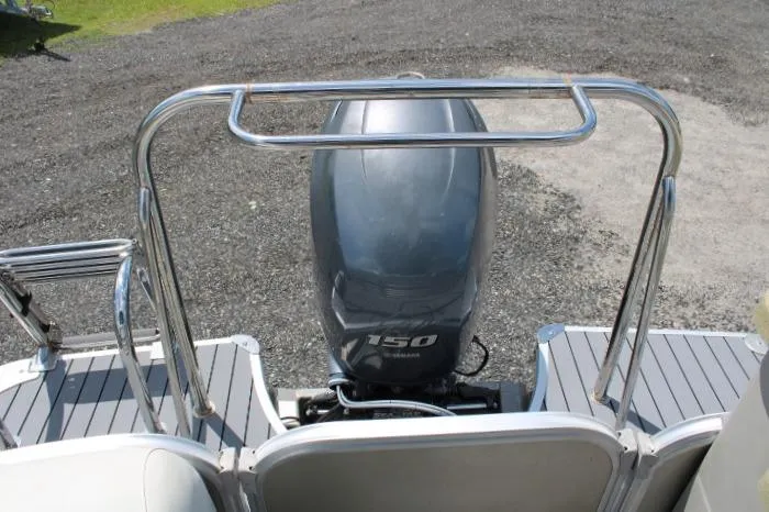 Slide: The Image of Rear view of 2015 South Bay 524E boat with Yamaha 150 outboard motor. - 6