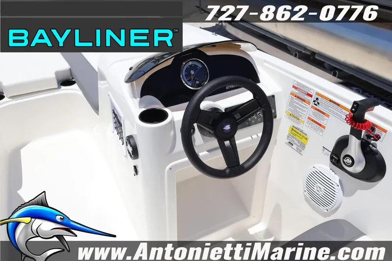 Slide: The Image of 2026 Bayliner Element E18 boat dashboard with steering wheel and controls, featuring Antonietti Marine branding. - 14