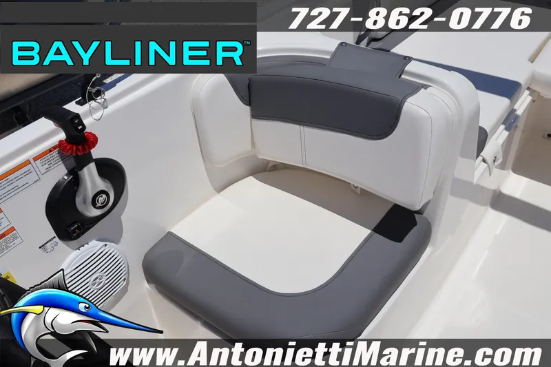 Slide: The Image of 2026 Bayliner Element E18 boat seat with control panel and speaker. - 18
