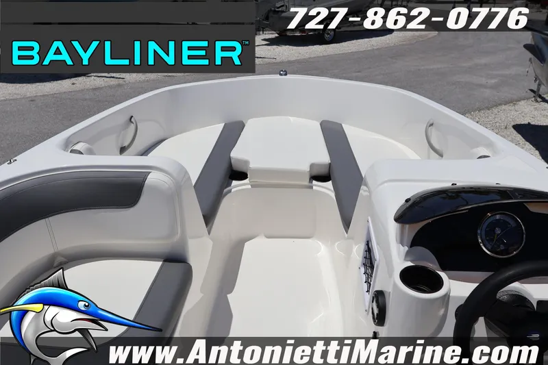 Slide: The Image of 2026 Bayliner Element E18 boat interior with seating and dashboard, Antonietti Marine branding. - 9