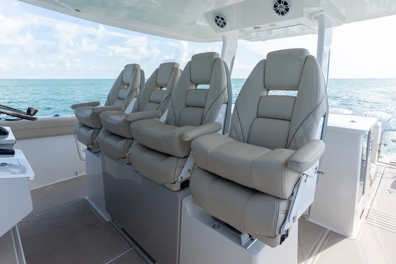 Slide: The Image of Luxurious seating on 2022 Regal 38 SAV boat with ocean view. - 29