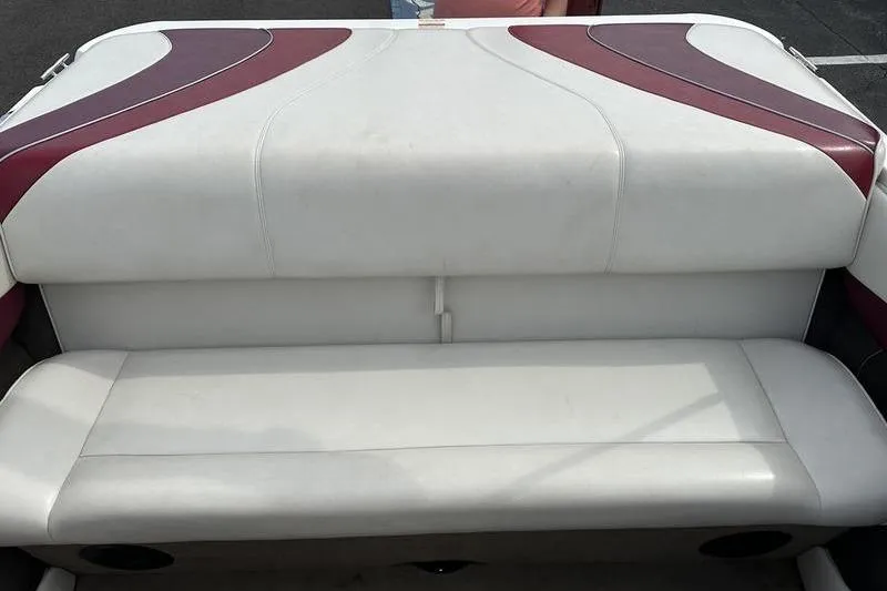 Slide: The Image of White and maroon seating on 2000 Ebbtide Campione 182 boat. - 11